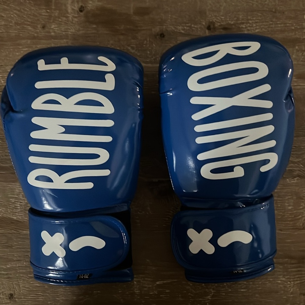 Brand new Rumble Limited Edition Boxing Gloves w/matching wraps & cinch bag